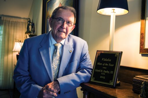 Dr. Lloyd H. Darby III with one of his many accolades for community service.