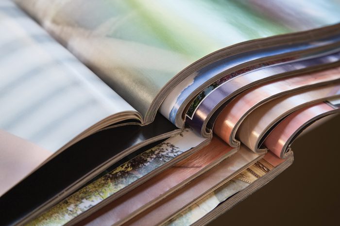 Close-up of stack of colorful magazines. Photo by Bigstock.