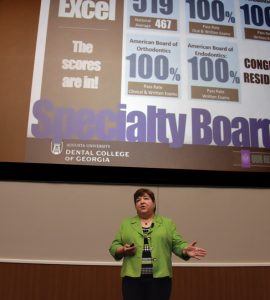 Carol Lefebvre presents the State of the College address.