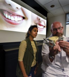 Dr. Mark Brunner (right) with Omnia Tawfik, an international research scholar from Cairo University who assists in his gummy-smile research