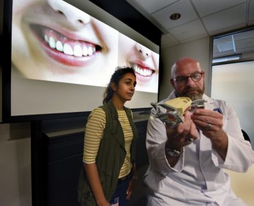 Dr. Mark Brunner (right) with Omnia Tawfik, an international research scholar from Cairo University who assists in his gummy-smile research