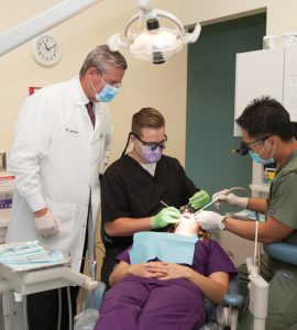 Glenn Crooks works with two senior DCG students.