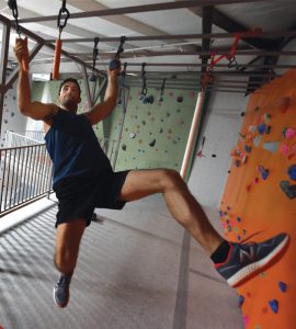 Jackson Griffeth scales ninja obstacles at Active Climbing Augusta. Photo by Phil Jones.