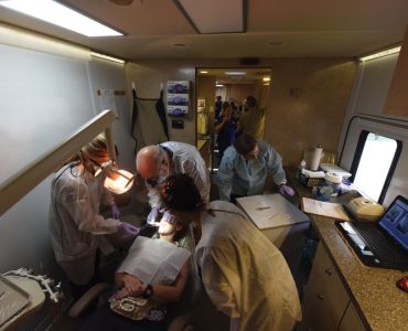 Ashley Pike, Dr. Van Haywood, Clara Shin and a dental assistant