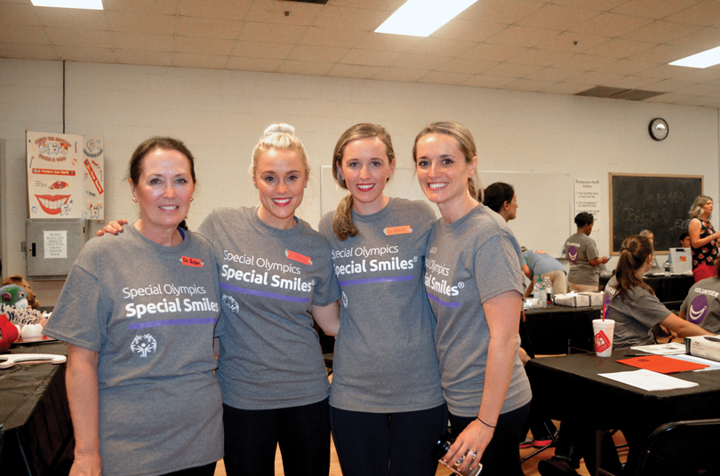 with daughters Stacey Reich Wingad, Alena Reich and Megan Reich Rihan at the Special Olympics.