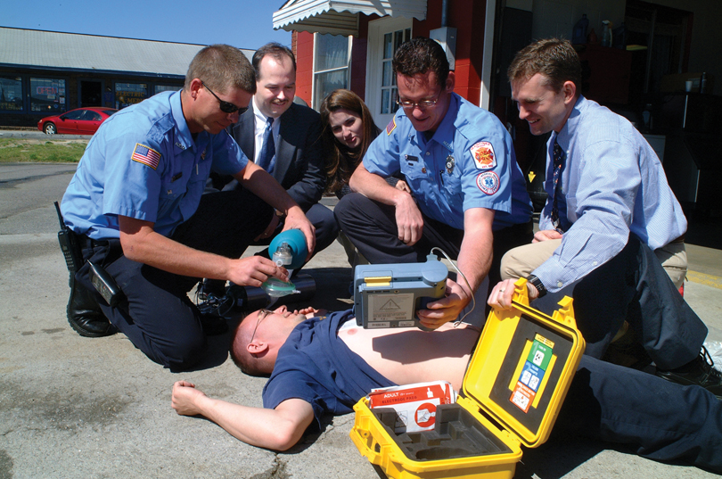 Coule, second from left, observes a simulation, circa 2002.