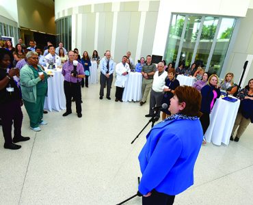 The dean addressing crowd