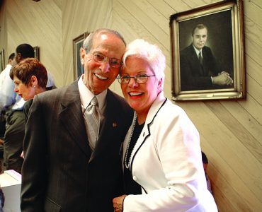 Man posing with woman