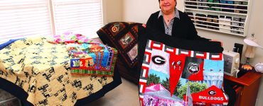 Woman with quilts