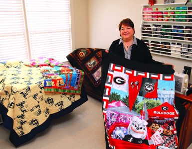 Woman with quilts