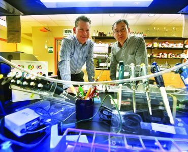 Dr. Joseph Miano and Dr. Lin Gan in lab