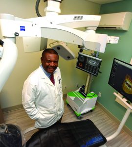 Dr. Emmanuel Ngoh in treatment room