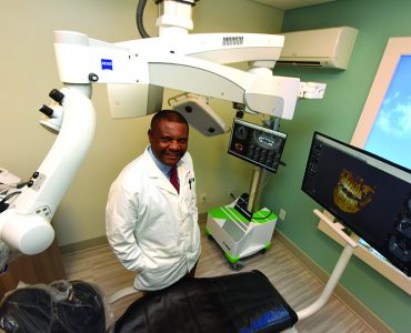 Dr. Emmanuel Ngoh in treatment room