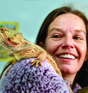 Dr. Catherine Jauregui with her bearded dragon.