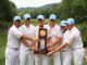 golfers holding trophy