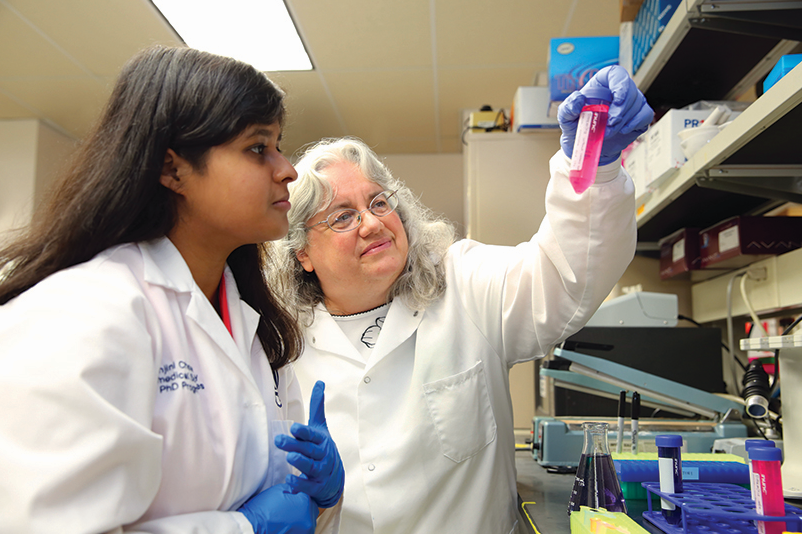 researchers in lab