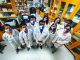 masked researchers in lab