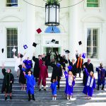 Graduates throwing caps and White House