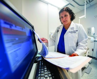 Scientist Mira Ghaly in lab