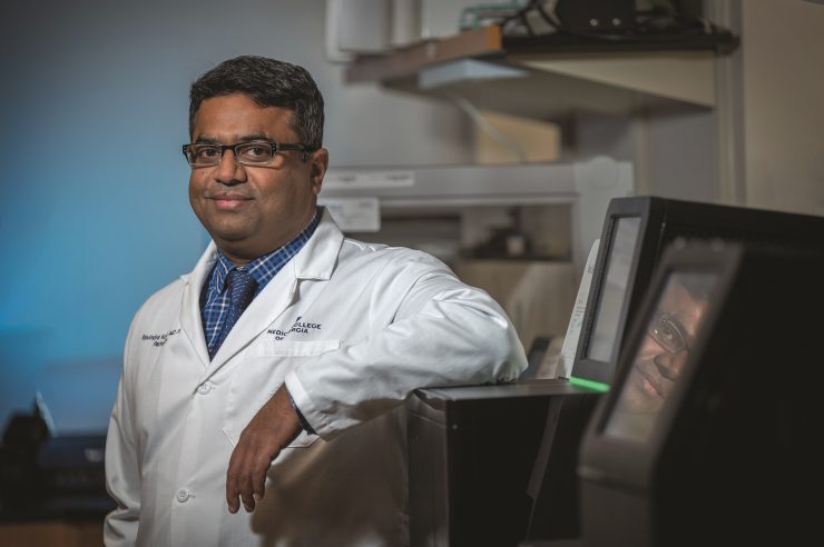 Dr. Ravindra Kolhe poses for the camera in his lab.