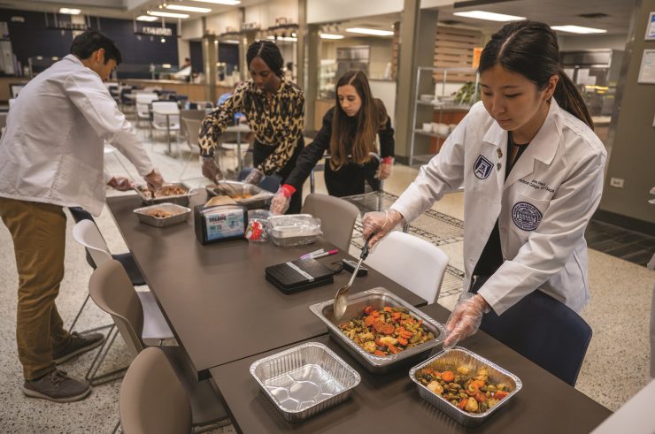 Medical students saving unused food