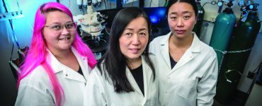 Xin-Yun Lu, MD, PhD, (center) with Graduate Student Kirstyn Denney (left) and Postdoctoral Fellow Yuting Chen, PhD, both coauthors on the new paper
