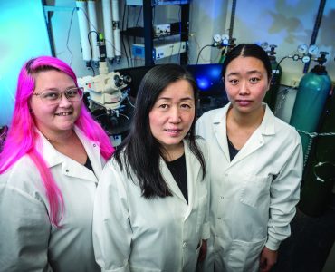 Xin-Yun Lu, MD, PhD, (center) with Graduate Student Kirstyn Denney (left) and Postdoctoral Fellow Yuting Chen, PhD, both coauthors on the new paper