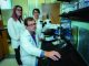 Dr. Zsolt Bagi photographed in his lab with August University graduate student Katie Anne Fopiano, left, and research assistant Yanna Tian, right