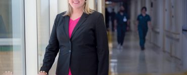 woman smiles at camera